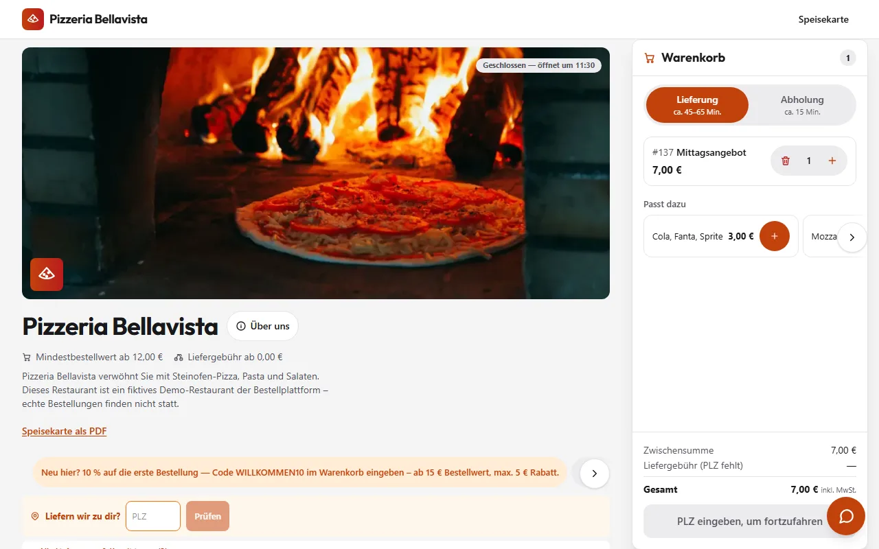 Ordering page of the demo pizzeria: stone oven picture, menu and cart with a lunch offer, prices including VAT.
